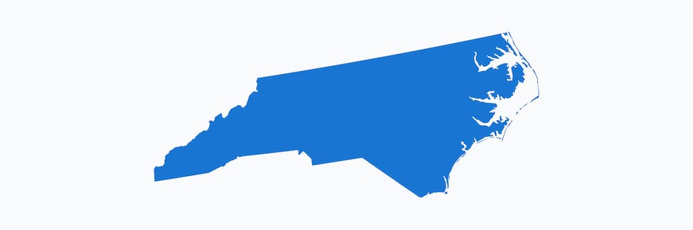 Image shown is a blue outline of the state of North Carolina.